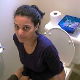 A mature, Hispanic woman records herself shitting while sitting on a toilet in 5 scenes. Plops, farting and pissing is clearly heard, although product is not shown. Over 7 minutes.